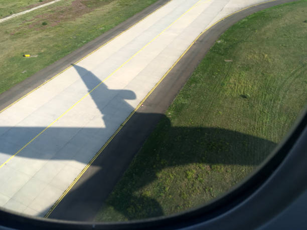 istock Plane takes off with shade on runway 1146604884