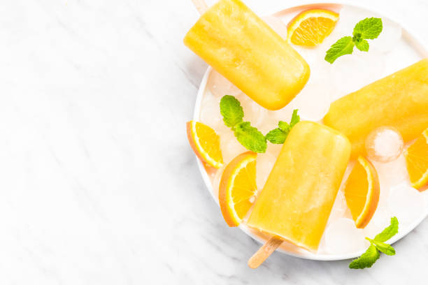 istock Homemade healthy refreshing orange popsicles 1146607694