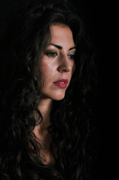 istock timid attractive woman beautiful lips 1146610262