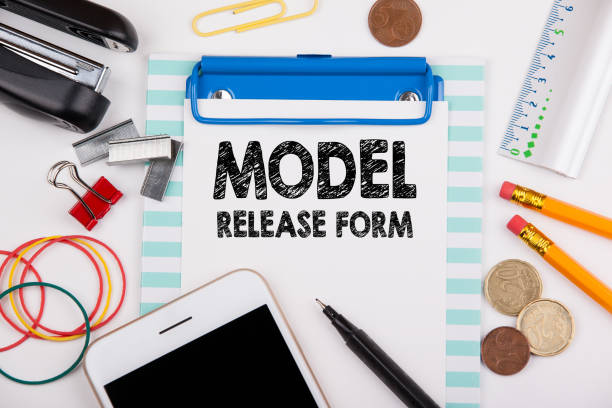 istock Model Release Form concept. Office desk with stationery 1146612689