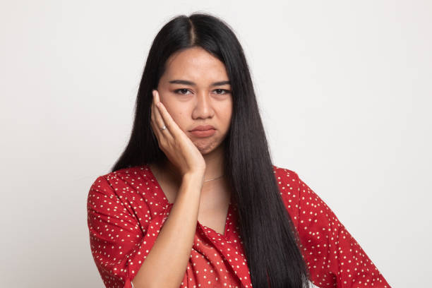 istock Young Asian woman got toothache. 1146619534