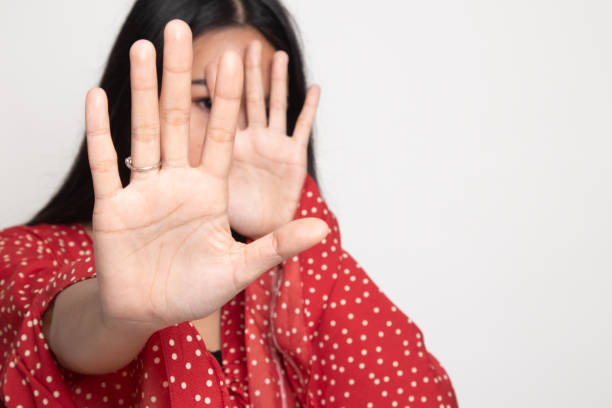 istock Young Asian woman hide her  face. 1146619653