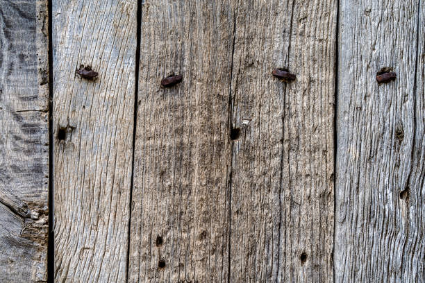 古い板と釘で古い木の質感の背景を閉じます - wood rustic close up nail ストックフォトと画像