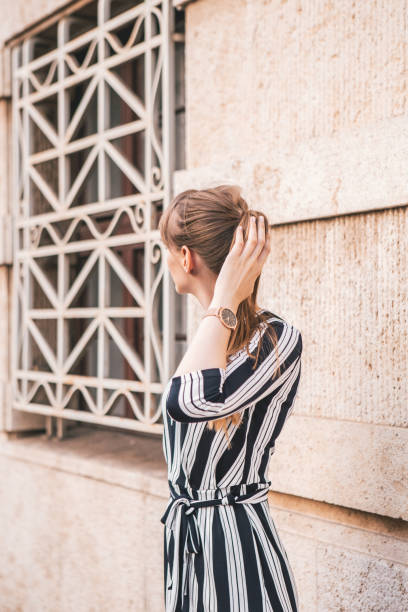istock Young Woman in Beautiful Urban Scenery 1146629157