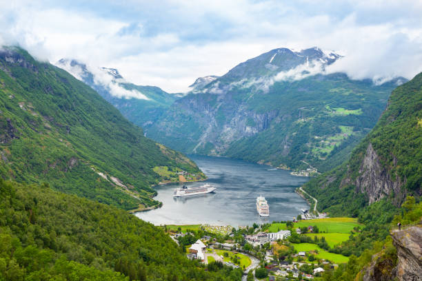 istock Cruise ship in Geiranger seaport, Norway 1146629331