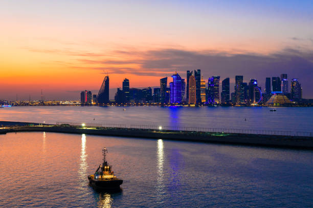 istock Doha, Qatar - view to modern skyline from the harbor in sunset 1146630846