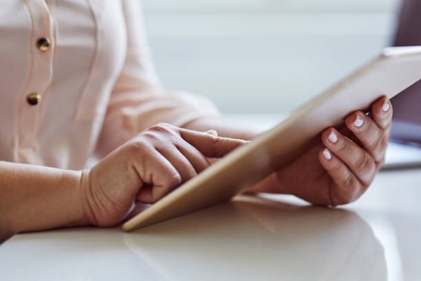 istock Woman working on a digital tablet in the office 1146630866