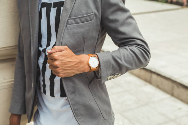 Young Man in Suit Wearing Analog Watch in the Urban environmen, City