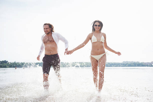 istock steam running along the water, beautiful summer beach 1146633278