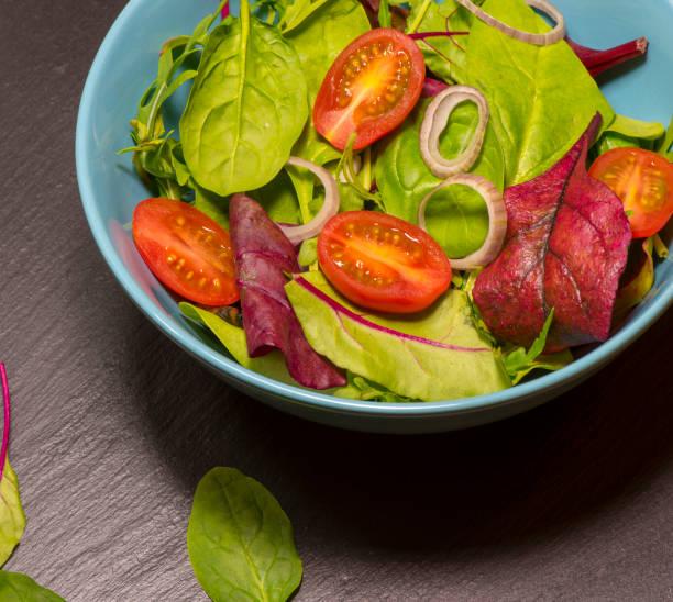 istock Leaf vegetable salad with tomato 1146634987
