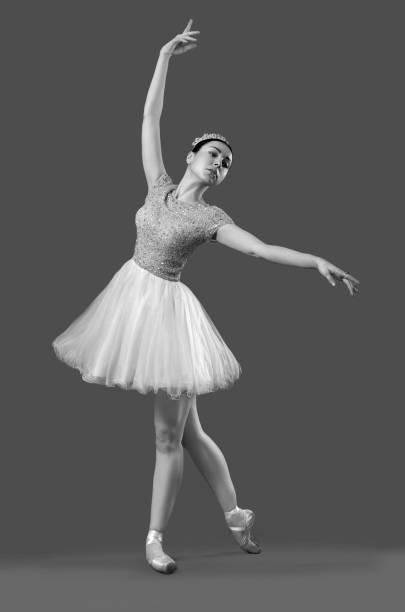 istock Pretty ballerina dancing and posing on isolated background 1146635116