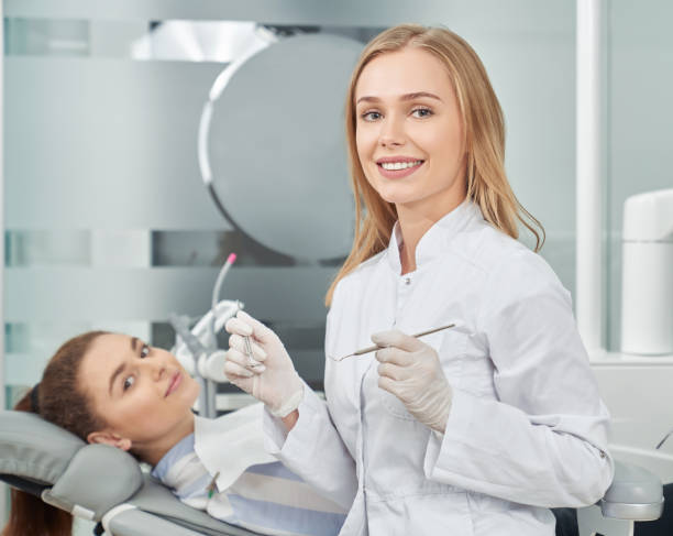 istock Client of dentistry clinic and dentist posing. 1146635285