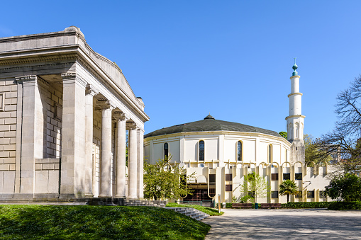Brussels, Belgium - April 22, 2019: The Great Mosque of Brussels, located in the Cinquantenaire Park next to the temple of Human Passions, is the seat of the Islamic and Cultural Centre of Belgium.