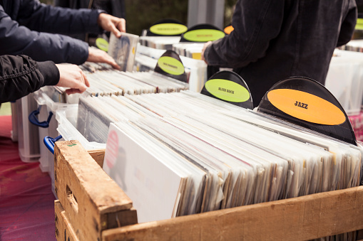 Choosing old records in flea market