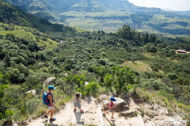 istock Mother hikes with her kids 1146640590