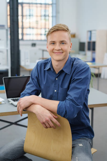 istock Relaxed attractive young businessman 1146641996