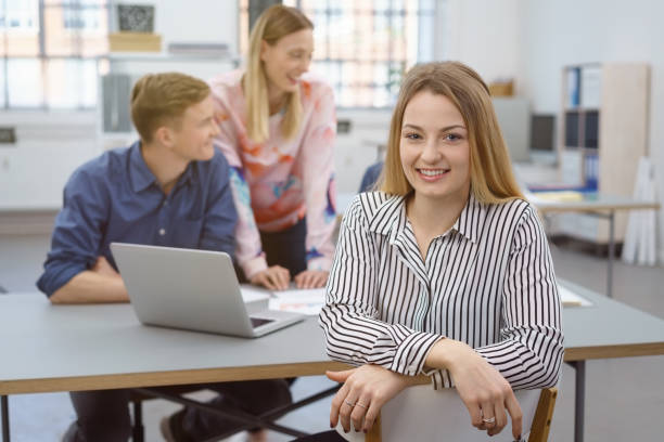 istock Relaxed happy young business woman 1146642274