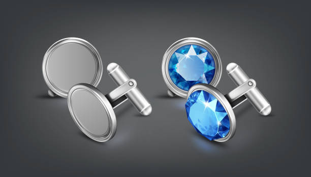 Vector realistic illustration of two pair silver or chrome cufflinks with blue gem isolated on background Vector realistic illustration of two pair silver or chrome cufflinks with blue gem isolated on dark background cufflink stock illustrations