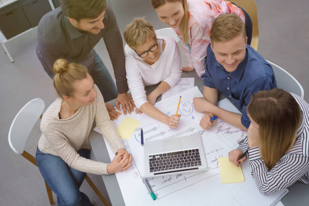 istock Young business team having a meeting 1146643750