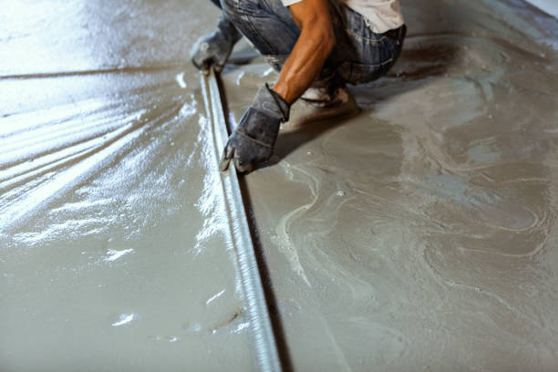 istock Smoothing the wet concrete floor by hand skill 1146646694