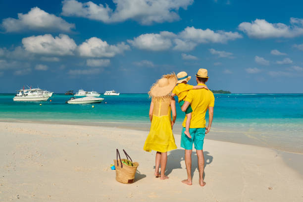 istock Family with three year old boy on beach 1146650148