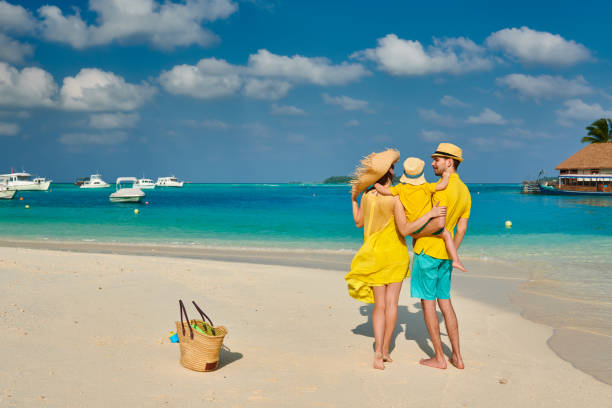 istock Family with three year old boy on beach 1146650178