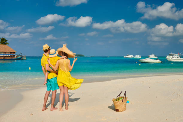 istock Family with three year old boy on beach 1146650182