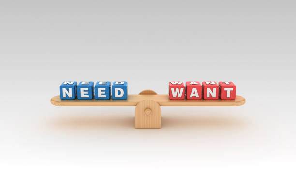 istock Seesaw with NEED WANT Buzzword Cubes - 3D Rendering 1146651905