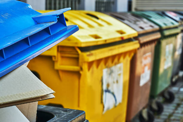 Dumpsters Dustbins on the street industrial garbage bin photos stock pictures, royalty-free photos & images