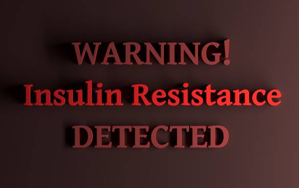istock Red words - Warning Insulin resistance detected on dark red background 1146655559