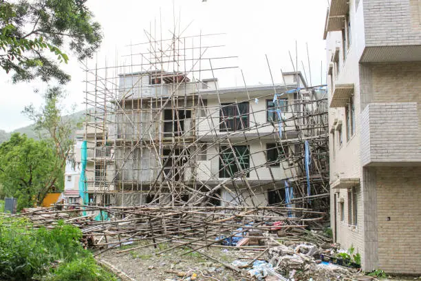 Photo of After the typhoon mangkhut in Hong Kong, 19 Sept, 2018. village house construction site, scaffolding collapse