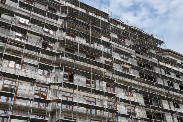 istock new building under construction, scaffolding and concrete 1146659660