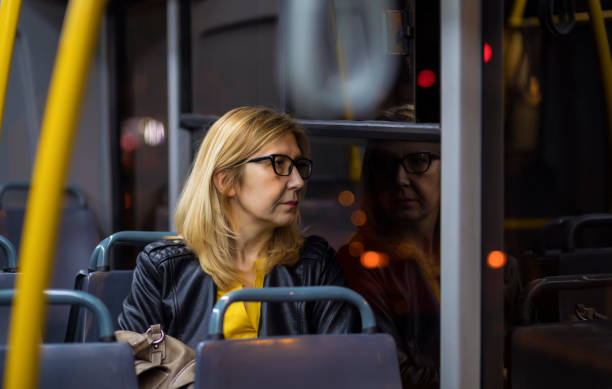 istock Mature woman in public transportation 1146671406