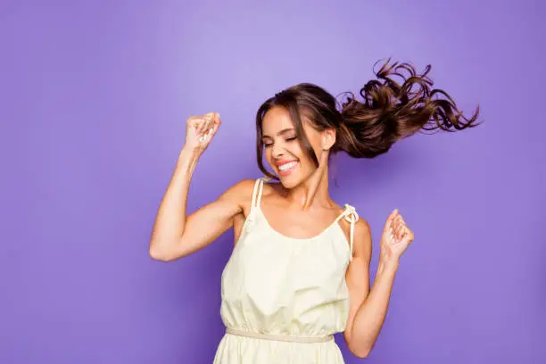 Close up photo of pretty attractive optimistic lovely she her lady raising fists hands up having free freedom inspiration isolated violet background.