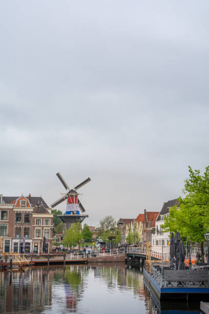 Windmill de valk (falcon) in Leiden, Netherlands  in dutch national colors red white blue for kings day and liberation day