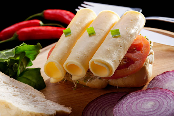 Sandwich with mozzarella cheese on wood background stock photo