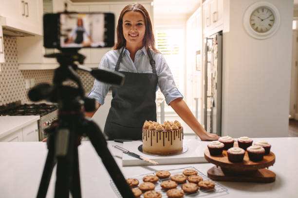 istock Woman recording vlog in kitchen 1146680246