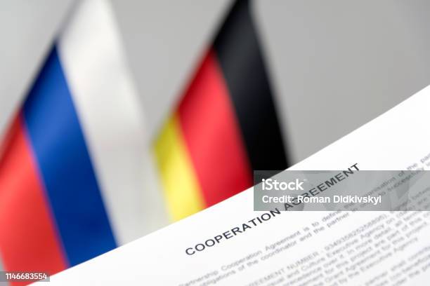 Russia Germany Flag Nord Stream 2 Contract Blurred Background Stock Photo - Download Image Now
