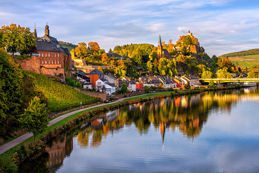 Saarburg historical Old Town on the hills in Saar river valley, Germany, in sunset light
