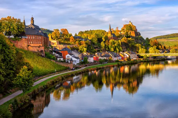 Saarburg historical Old Town on the hills in Saar river valley, Germany, in sunset light