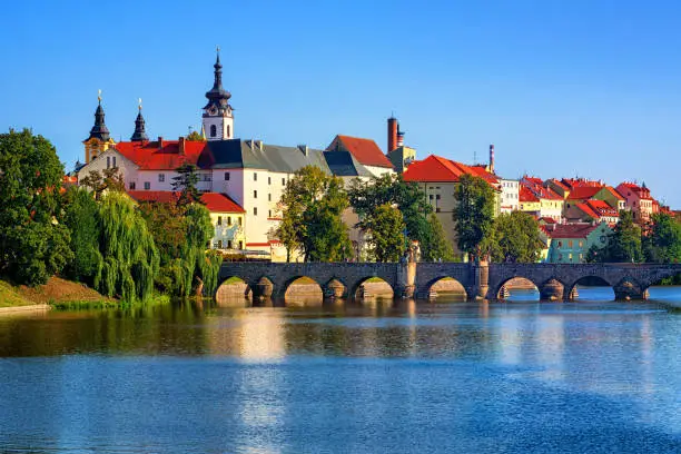Historical Pisek Old Town, Czech Republic, with stone Old Bridge, Pisek Castle and St Mary Church