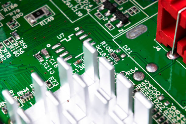 istock Macro shot of Circuit board with resistors microchips and electronic components. Computer hardware technology. Integrated communication processor. Information engineering. Semiconductor. PCB. Closeup 1146691103