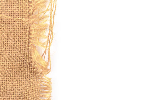 istock Old jute burlap sack. White background for text and picture on right. 1146693080