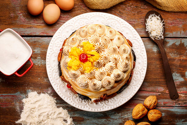 istock Chocolate cakes, chocolate pies, wood background, icing sugar, strawberry pie, cakes 1146693140