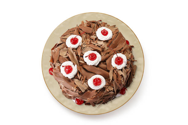Chocolate cakes, chocolate pies, wood background, icing sugar, strawberry pie, cakes stock photo