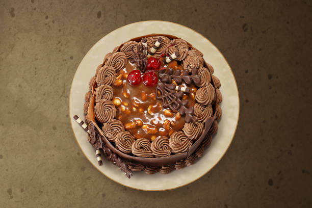 istock Chocolate cakes, chocolate pies, wood background, icing sugar, strawberry pie, cakes 1146694603