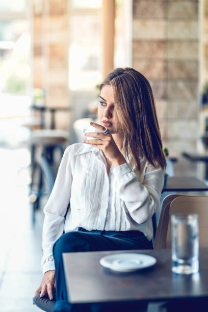 istock Modern Female Enjoying Coffee In Favorite Bar 1146695319
