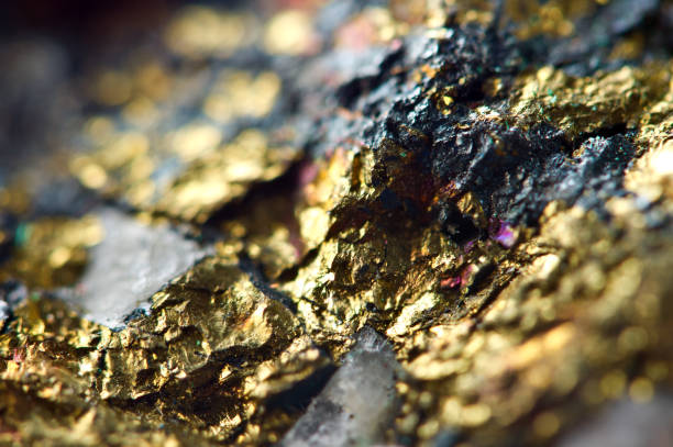黄金の背景。ゴールドナゲット。プロジェクトの背景。マクロ - mineral ストックフォトと画像