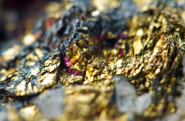 istock Golden background. Gold nugget. Backdrop for the project. Macro 1146703442