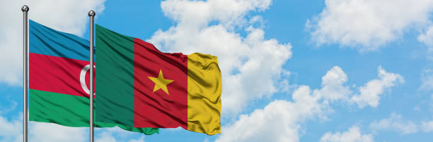 Azerbaijan and Cameroon flag waving in the wind against white cloudy blue sky together. Diplomacy concept, international relations. Azerbaijan and Cameroon flag waving in the wind against white cloudy blue sky together. Diplomacy concept, international relations. yaounde photos stock pictures, royalty-free photos & images